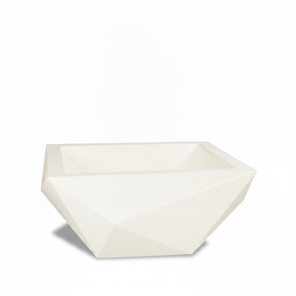 A modern, geometric rectangular planter with a faceted, diamond-like design, shown in a warm off-white or cream color on a solid white background.