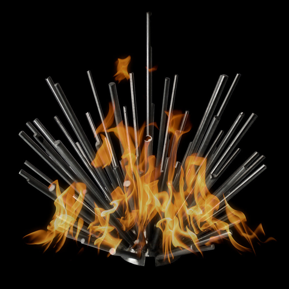 The Outdoor Plus Steel Desert Sticks ornament shown with flames against a black background