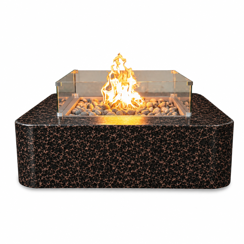 A modern square fire pit table with a black and copper speckled exterior, a clear acrylic wind guard, and a glowing fire with decorative stones inside, shown on a solid white background.