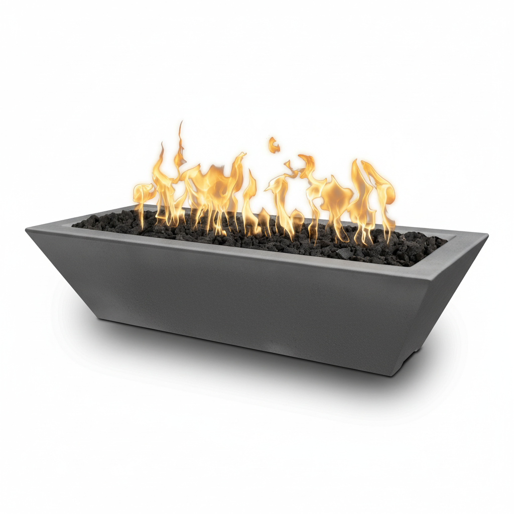 A modern rectangular outdoor fire pit with a matte dark gray concrete-look body, black decorative stones, and active orange and yellow flames, shown on a clean white background.