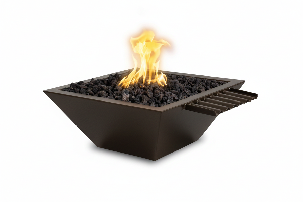A modern square black fire pit table filled with dark lava rocks and showing a bright yellow and orange flame, isolated on a white background.
