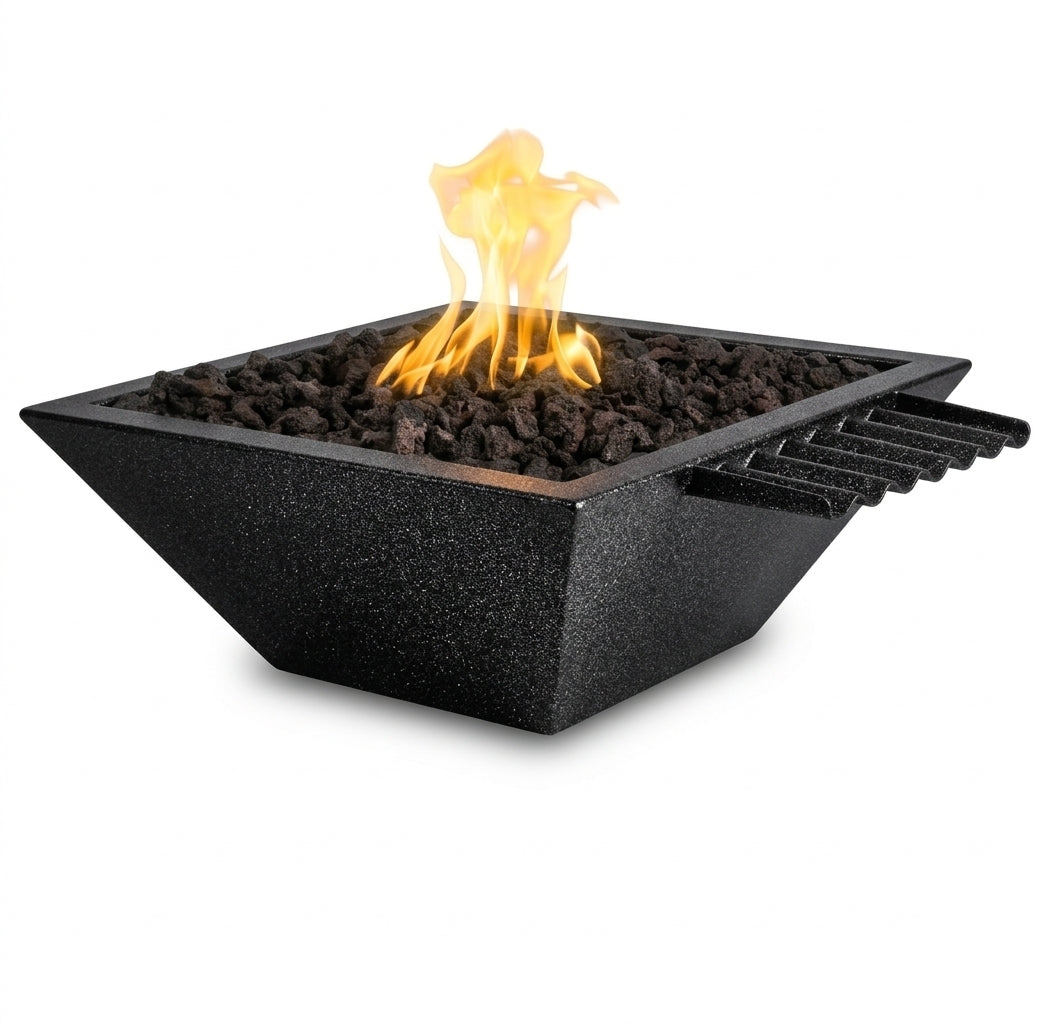 A modern square black fire pit with a textured finish, filled with dark gravel and featuring a bright yellow-orange flame, shown on a solid white background.