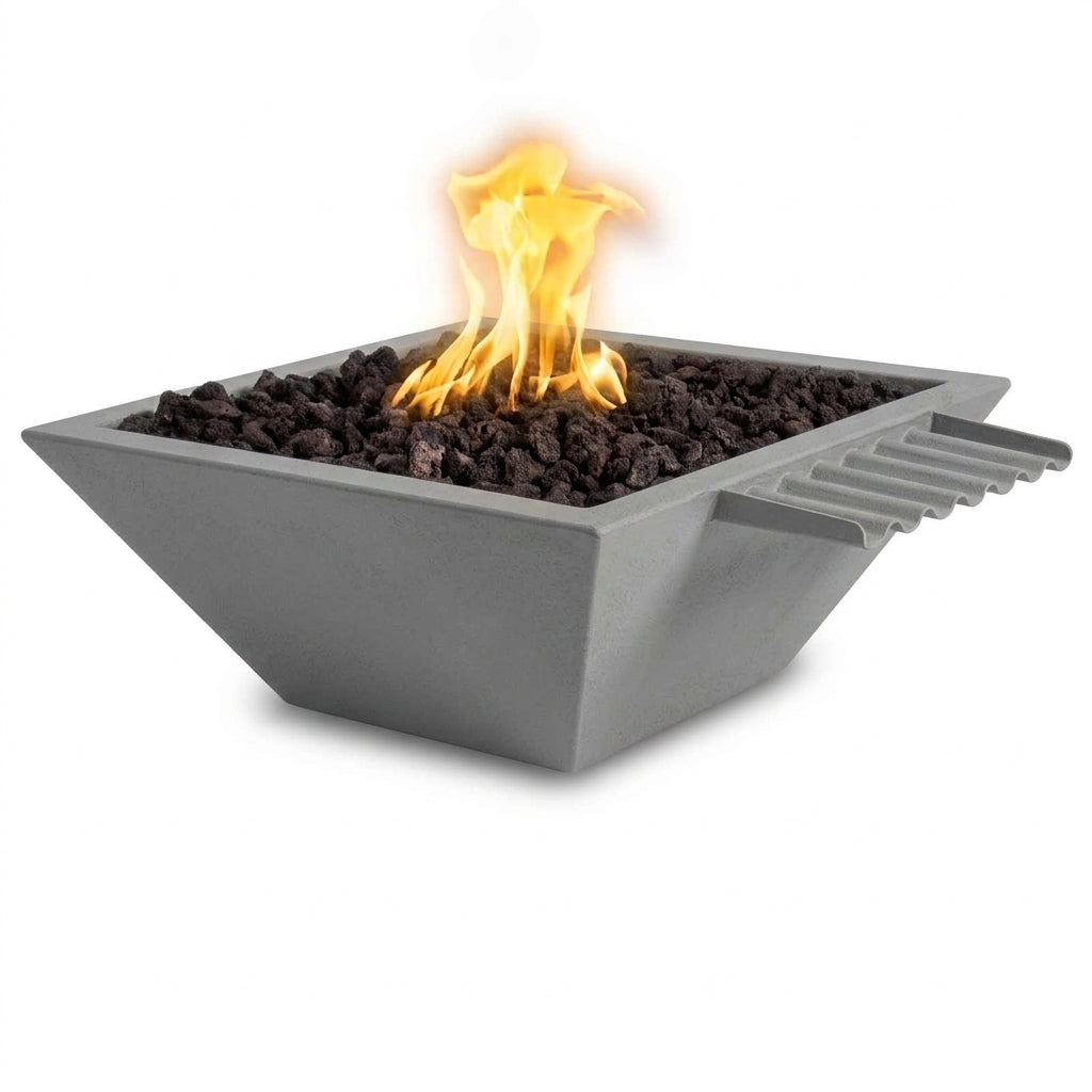 A square concrete fire pit bowl filled with dark lava rocks and active orange flames, shown on a clean white background.