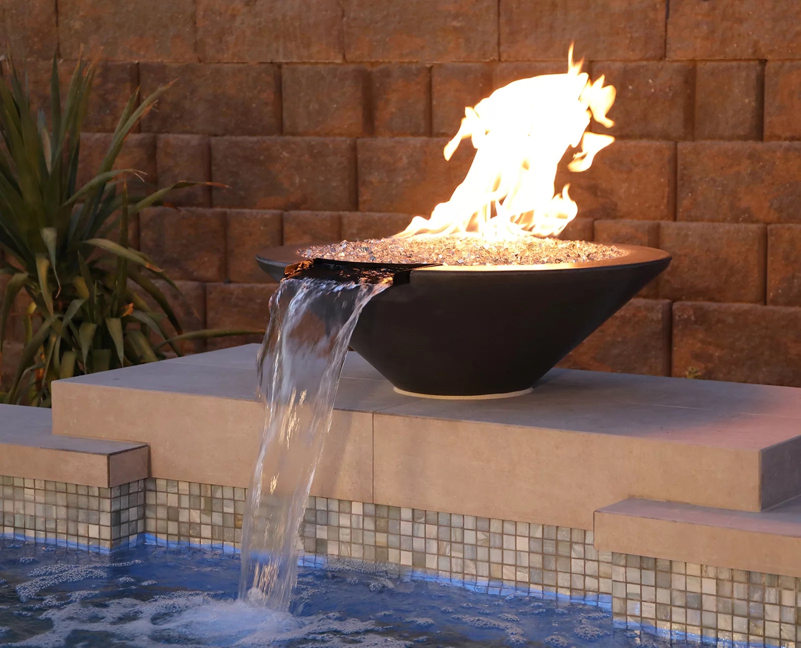 Fire pit with water feature in a backyard setting