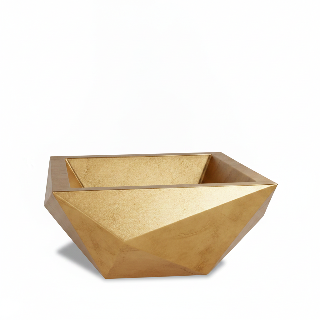 A modern geometric gold planter bowl with a faceted, diamond-like design, shown on a clean white background.