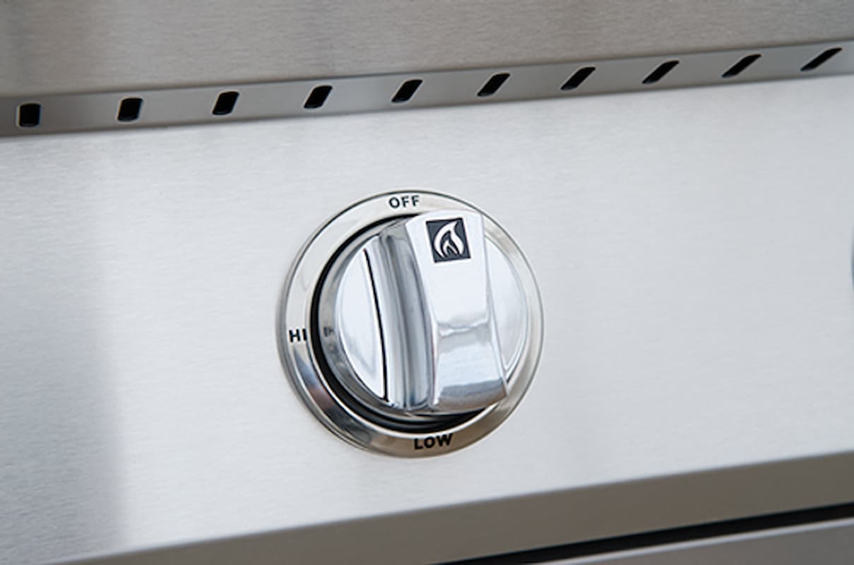 Stainless steel gas stove control knob with 'OFF', 'Hi', and 'Lo' settings.