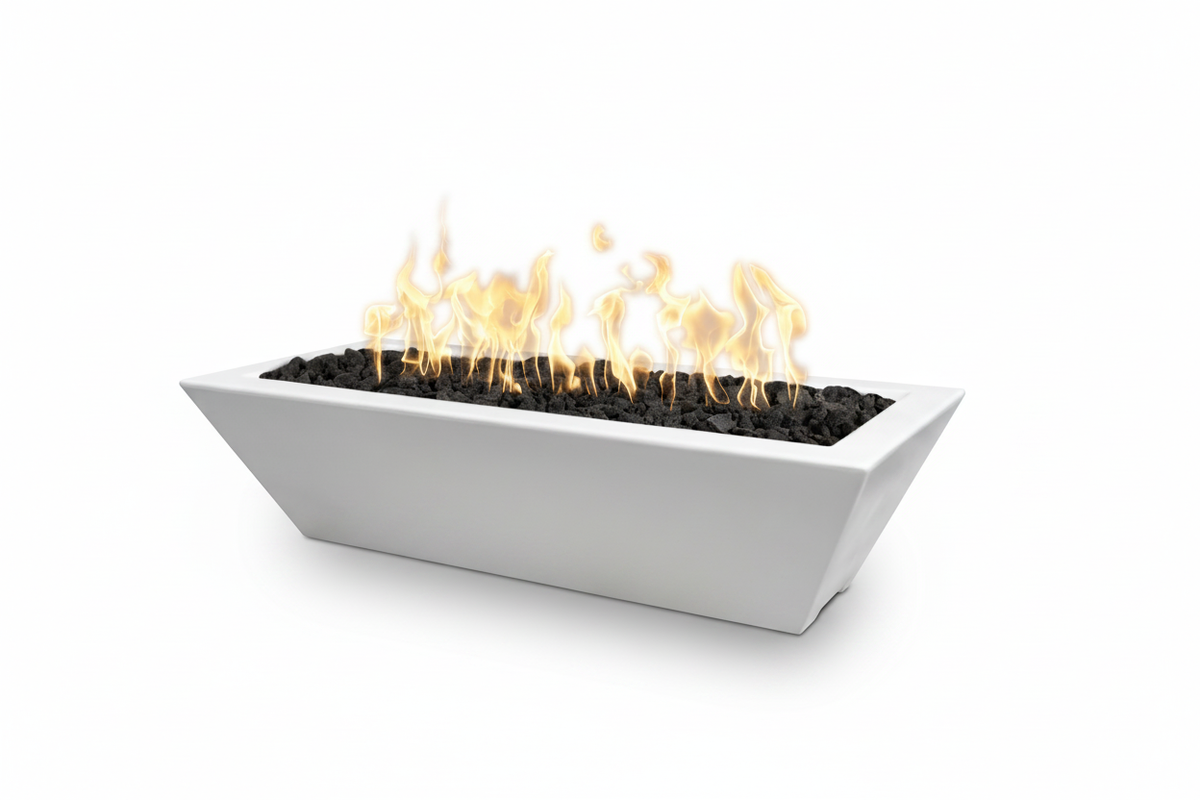 A modern rectangular outdoor fire pit with a white concrete-look planter, black stones, and active orange and yellow flames, shown on a solid white background.