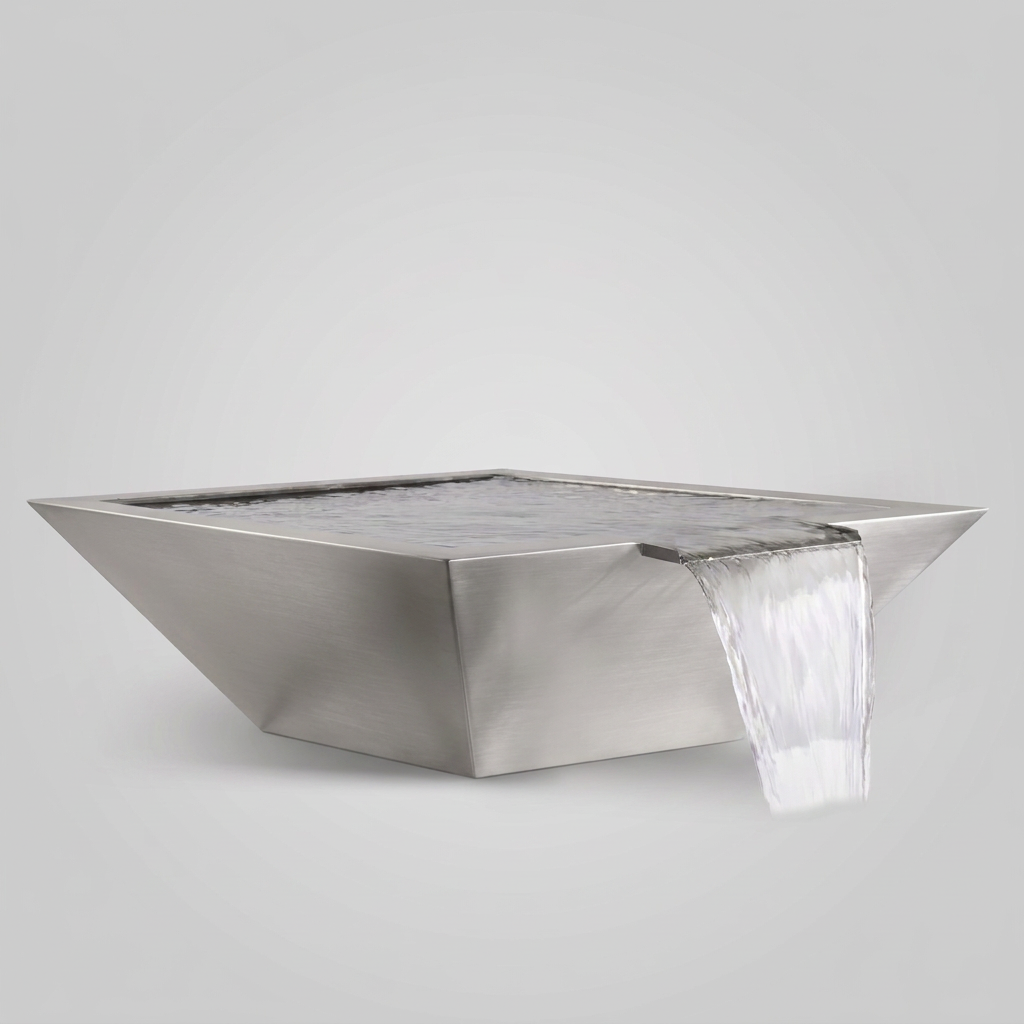 Maya Water Bowl with smooth stainless-steel surfaces on a gray background