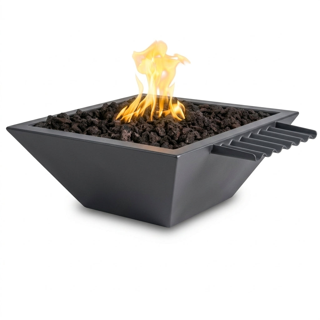 A square black fire pit table filled with dark lava rocks and showing a bright yellow-orange flame, isolated on a white background.